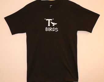 T-Birds Tee Shirts Adult Sizes From The Movie Grease Hanes Beefy Tee Brand 100% Cotton. Same Day Shipping. Priority Mail Is 2-3 Days.