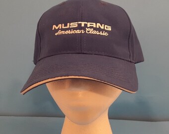 Mustang Hat Embroidered. Velcro Closure. Adams Brand Item # PE102 Colors Available, Black, Royal Blue and Teal.