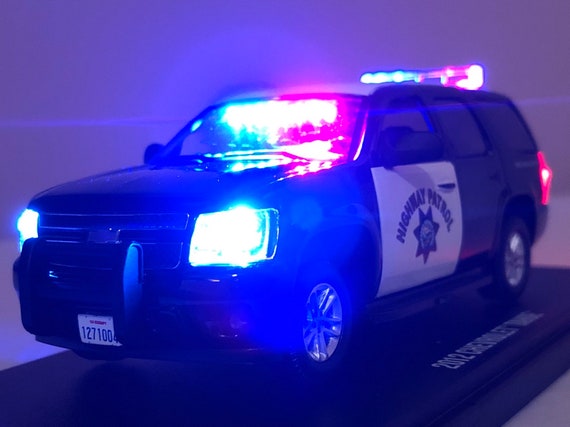 toy police cars with lights and sirens