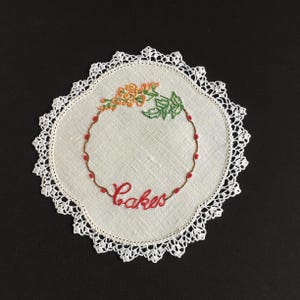 Vintage Hand Embroidered Linen Doily with Floral Pattern and a Crocheted Cotton Lace Edge