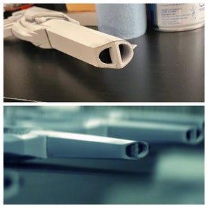 Close-up of the 3D printed ray gun prop’s split barrel opening, a detail often overlooked by fans. Comparison image with my version on top and the original prop from Danger Days music videos below. Perfect for MCR fans & collectors seeking accuracy.