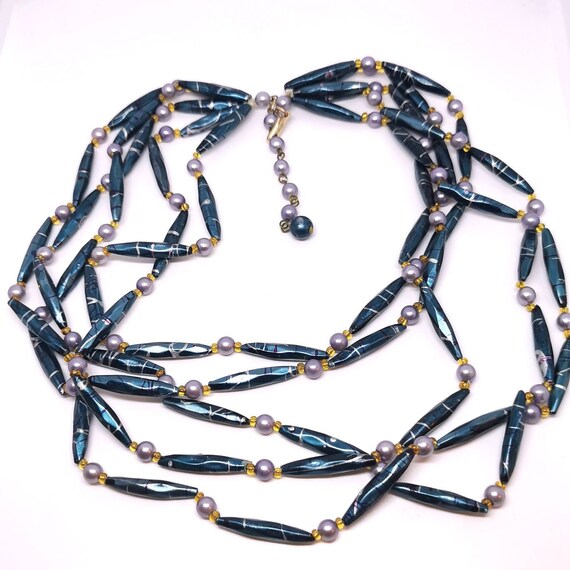 1950s Festooning multistrand necklace. Long plasti