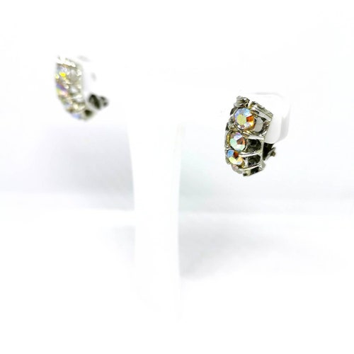 Vintage mid century clip on earrings. Aurora shops borealis rhinestones. Retro. Bling.