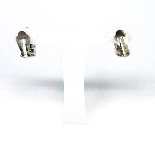 Vintage mid century clip on earrings. Aurora shops borealis rhinestones. Retro. Bling.