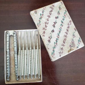 Vintage HMQ nutcracker and picks set in original box