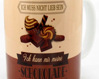 Keramiktasse weiß "Ich muß nicht lieb sein, ich kann mir meine Schokolade selbst kaufen."