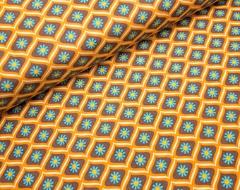May include: Orange fabric with a repeating pattern of brown squares and blue and yellow flowers.