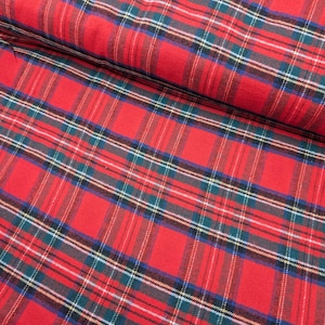 May include: Red plaid fabric with a green, white, and blue plaid pattern.