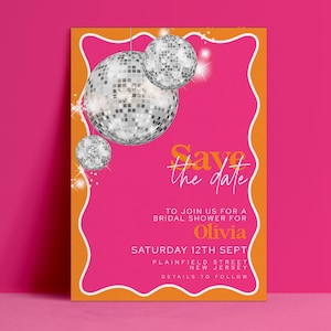 May include: A rectangular invitation card with a bright pink centre and orange border featuring three silver disco balls in the upper left corner. The text reads: Save the date to join us for a bridal shower for Olivia, Saturday 12th Sept, Plainfield Street, New Jersey, details to follow.