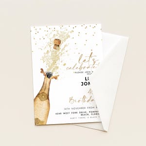 May include: A white invitation card with a champagne bottle illustration. The bottle is gold with a cork popping, and the words "let's celebrate!" are written in gold script. Additional text includes party details.