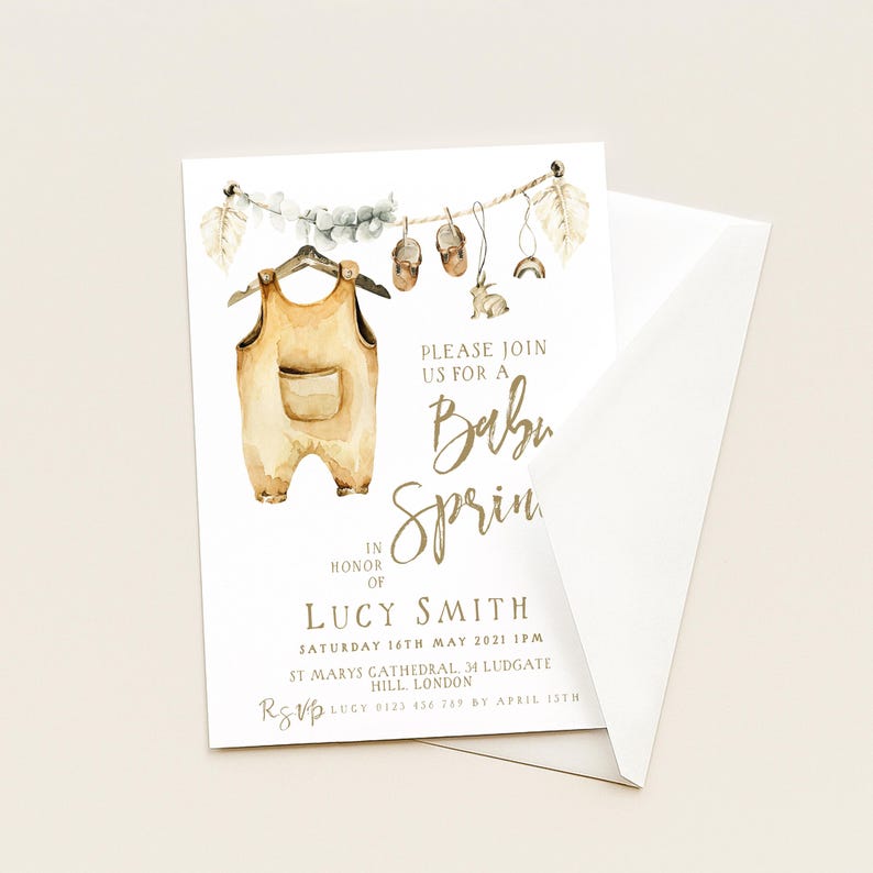 May include: Baby shower invitation featuring a watercolor illustration of a baby outfit hanging on a clothesline with small shoes, a rabbit, and a rainbow. The invitation includes the text "Please join us for a Baby Sprin" and event details.