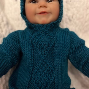 Hand-knit dark teal baby sweater