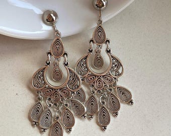 Silver clip on dangling filigree tassel earrings