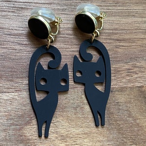 Dangling midcentury styled black cat clip on earrings