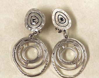 Silver dangling clip on abstract hoop earrings