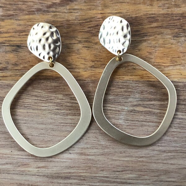 Dangling matte gold hoop clip on earrings