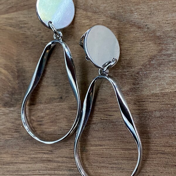 Dangling shiny silver oblong hoop clip on earrings| simple geometric clip on hoops