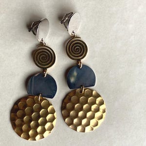 Dangling mixed metal clip on earrings