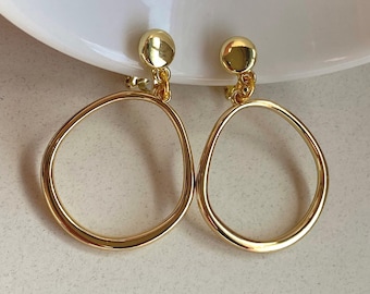 Simple clip on gold dangling hoop earrings, gold  tone ear clips