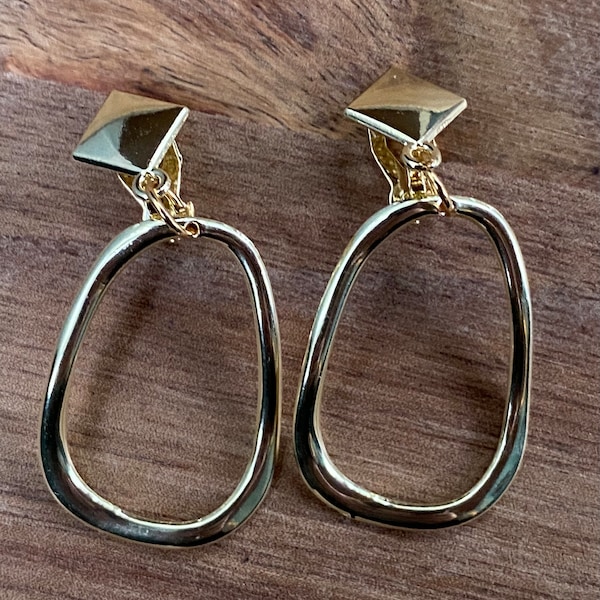Dangling shiny gold hoop clip on earrings| simple geometric clip on hoops