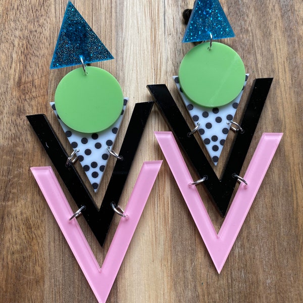 Retro plastic mega oversized clip on triangular 1980s inspired earrings, giant hinged screwback earrings