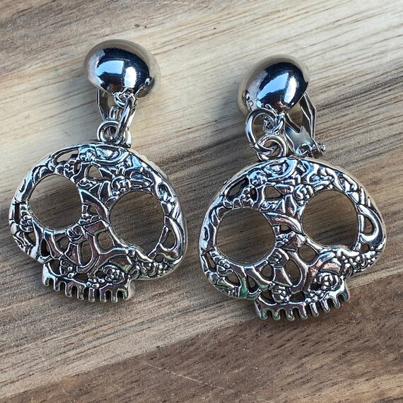 Skull clip on earrings clearance