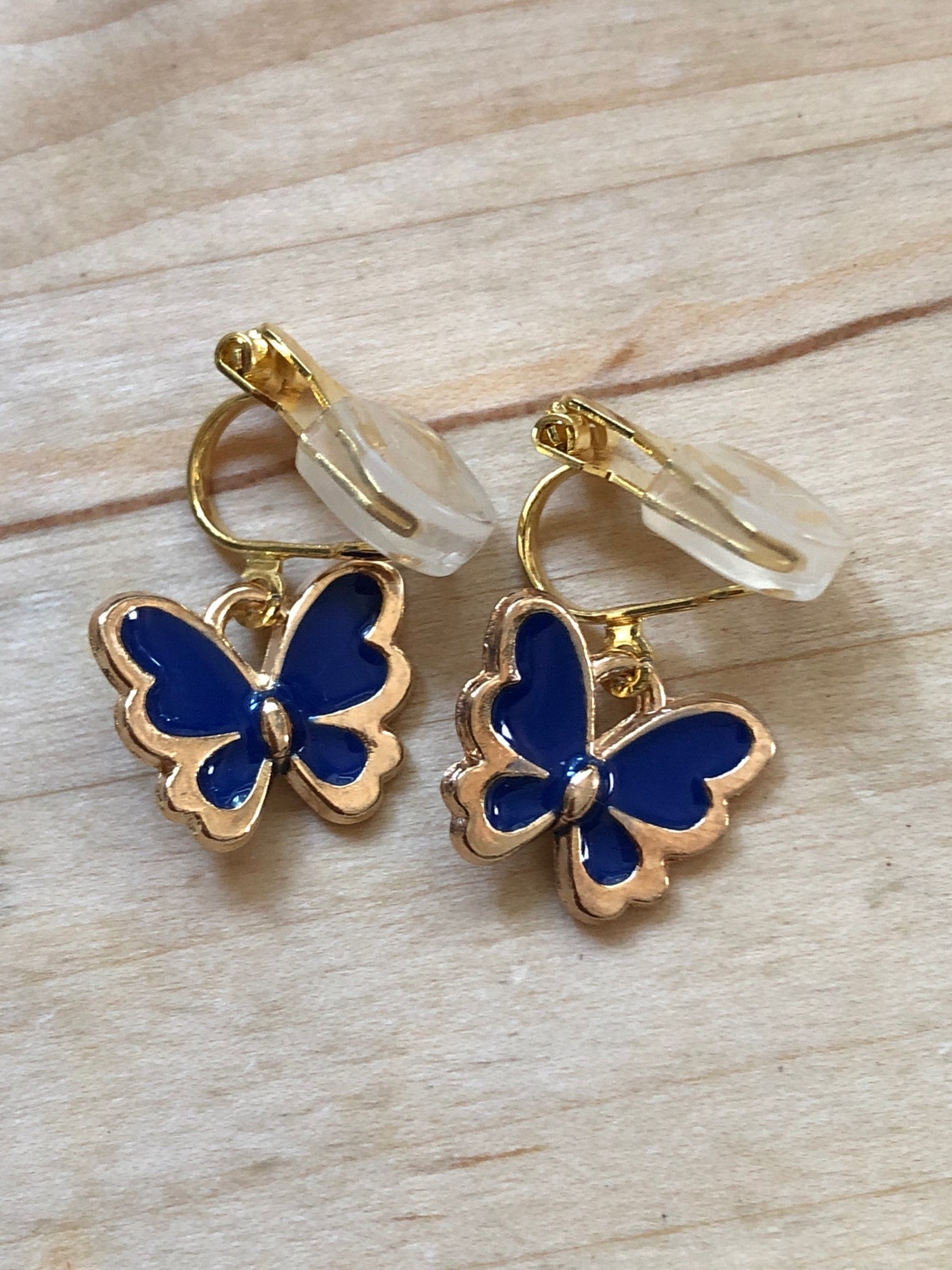 Tiny butterfly clip on earrings | Etsy