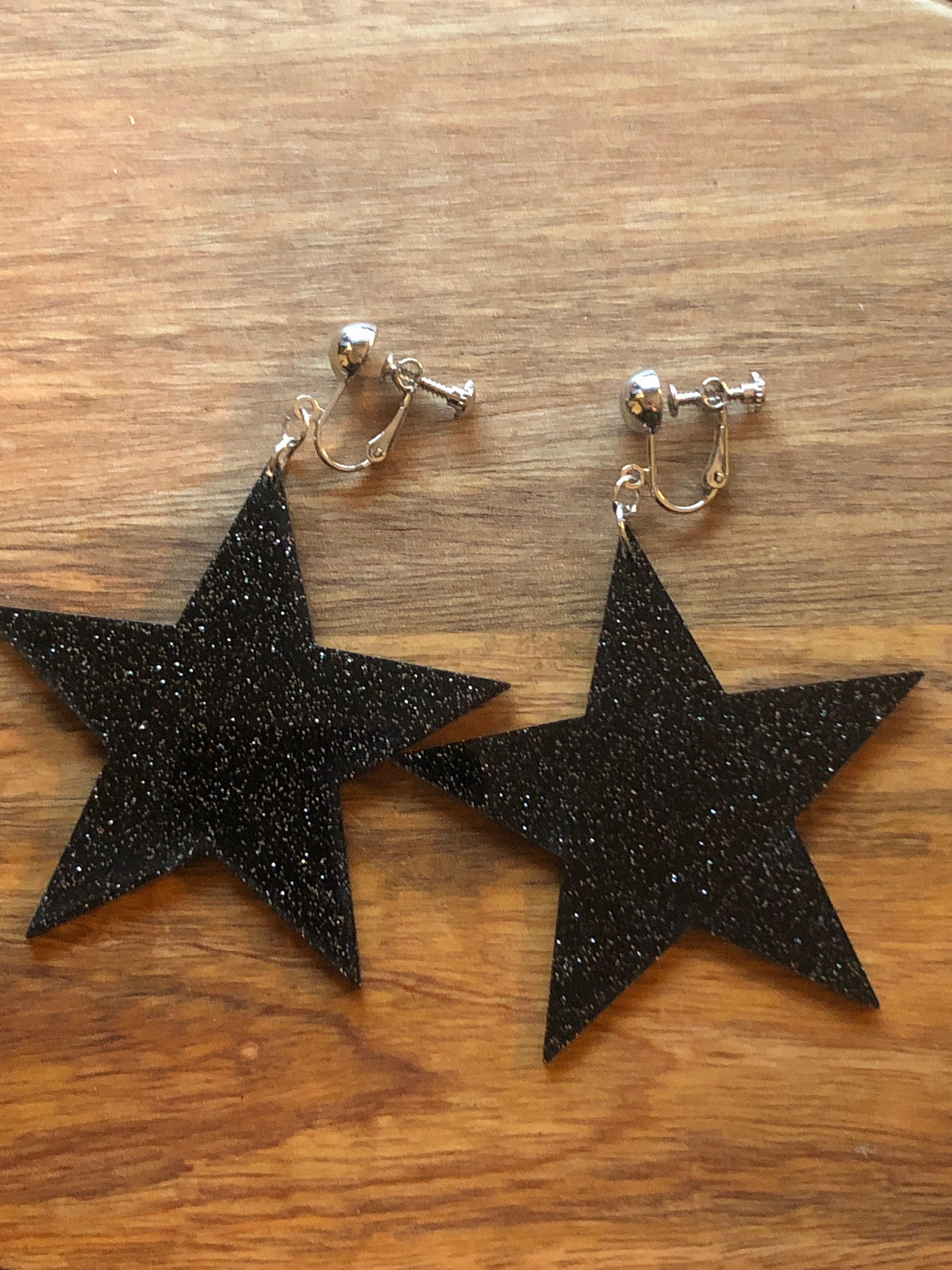 Sparkly star earrings sale