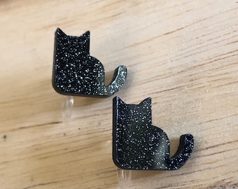 Invisible plastic glitter black cat clip on earrings