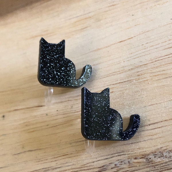 Invisible plastic glitter black cat clip on earrings