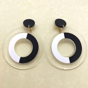 Oversized clip on black and white plastic hoop earrings