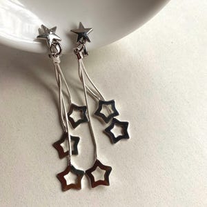 Silver Star Tassel Clip On Earrings: Dramatic Dangle Earrings