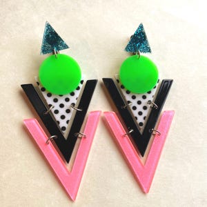 Retro plastic mega oversized clip on triangular 1980s inspired earrings, giant hinged screwback earrings