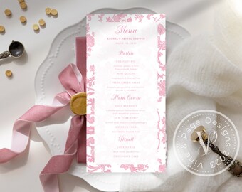 May include: A pink and white bridal shower menu card with a floral design. The menu includes starters, main course, and dessert. The text on the card reads "Menu", "Rachel's Bridal Shower", "March 31, 2023", "Starters", "Main Course", "Eggs Benedict", "Dessert", "Chocolate Cake".
