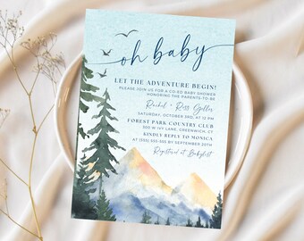 May include: A blue and white baby shower invitation with a watercolor illustration of mountains, trees, and a sunset. The text reads "oh baby" and "Let the adventure begin!" with details about the event, including the date, time, location, and RSVP information.