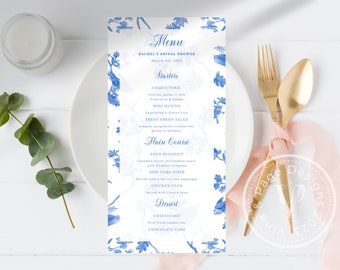 May include: A blue and white menu for a bridal shower with a floral design. The menu lists starters, main course, and dessert options. The text reads "Menu", "Rachel's Bridal Shower", "March 5th, 2023", "Starters", "Charcuterie", "Mini Quiche", "Fresh Green Salad", "Main Course", "Eggs Benedict", "New York Strip", "Chicken Club", "Dessert", "Cheesecake", "Chocolate Cake".