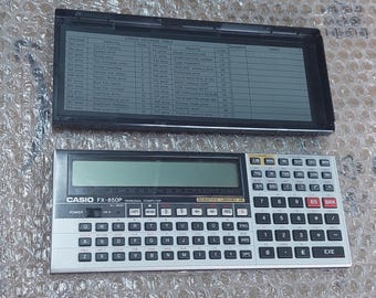 希少なビンテージ Casio fx-850p ポケットコンピュータ（rp-33 RAM パック搭載）*** 必ずお読みください ***