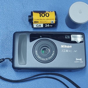 Nikon Zoom 310 AF PANORAMA Quartz Date Point and Shoot w/ Case *** Good ***
