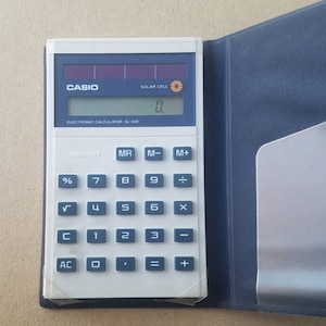 NOS Vintage Casio SL-300 Calculator Solar Cell Compact Case Pocket , Made in Japan