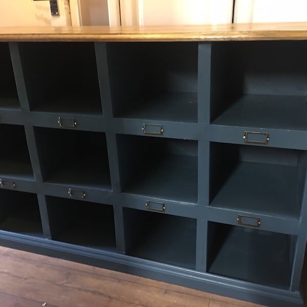 Storage cupboard with waxed and polished top