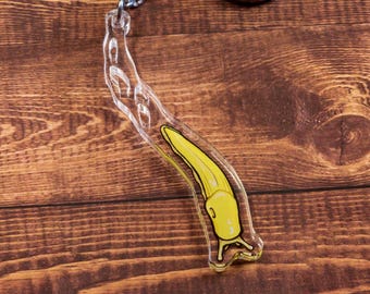 Llavero de babosa banana con rastro de limo