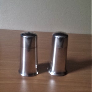 Elkington silver plated salt and pepper , Military mark, 6.5 cms. tall