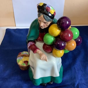 Figurine Royal Doulton Le vieux vendeur de ballons