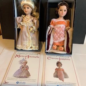 Two Atlas historical dolls , Empress Josephine and Marie Antoinette