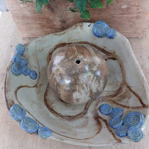 Hand-made cat fountain or indoor fountain in vintage style
