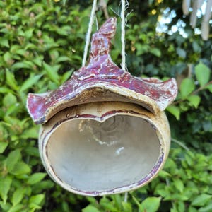 Hand-thrown mini bird feeders for tits