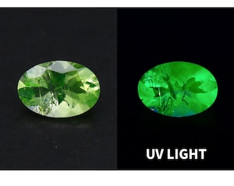 Natural Daylight Fluorescent Hyalite Opal 0.24 Carat 5.6x3.9 MM Oval Shape Faceted Gemstone