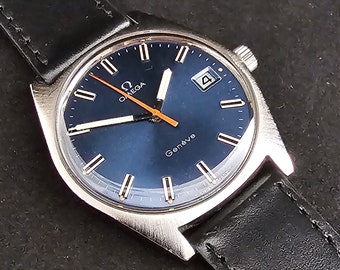 Omega Geneve 136.041, reloj de pulsera automático, esfera azul, manecilla de barrido naranja, c.1969, revisado