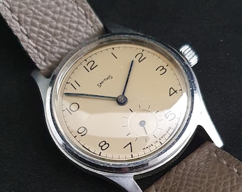 Smiths Pre-Deluxe-polshorloge, Dennison Aquatite-kast, circa 1949-1950