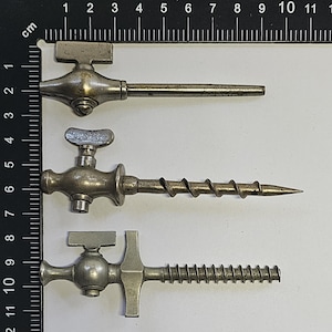 Collection of Three Trocar or Champagne Taps, Soda Spikes, circa 1910-1940, French